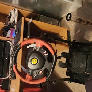 thrustmaster steeringwheel and pedals also comes with stand